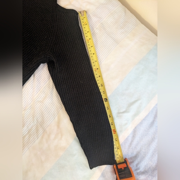 Black Off-the-Shoulder Sweater with Unique Cut-Out Neckline and Fitted Sleeves - Picture 4 of 9